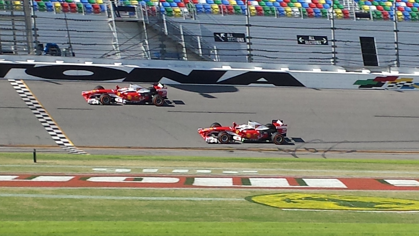 F1 drivers Kimi Räikkönen and Sebastian Vettel turn laps in F60s at Daytona International Speedway Sunday. (Photo: Greg Engle) 